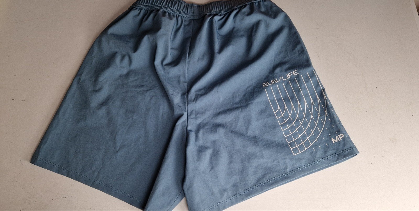 Myprotein sportbroek - Zo goed als nieuw, Blauw, Ophalen of Verzenden, My protein, Maat 36 (S)