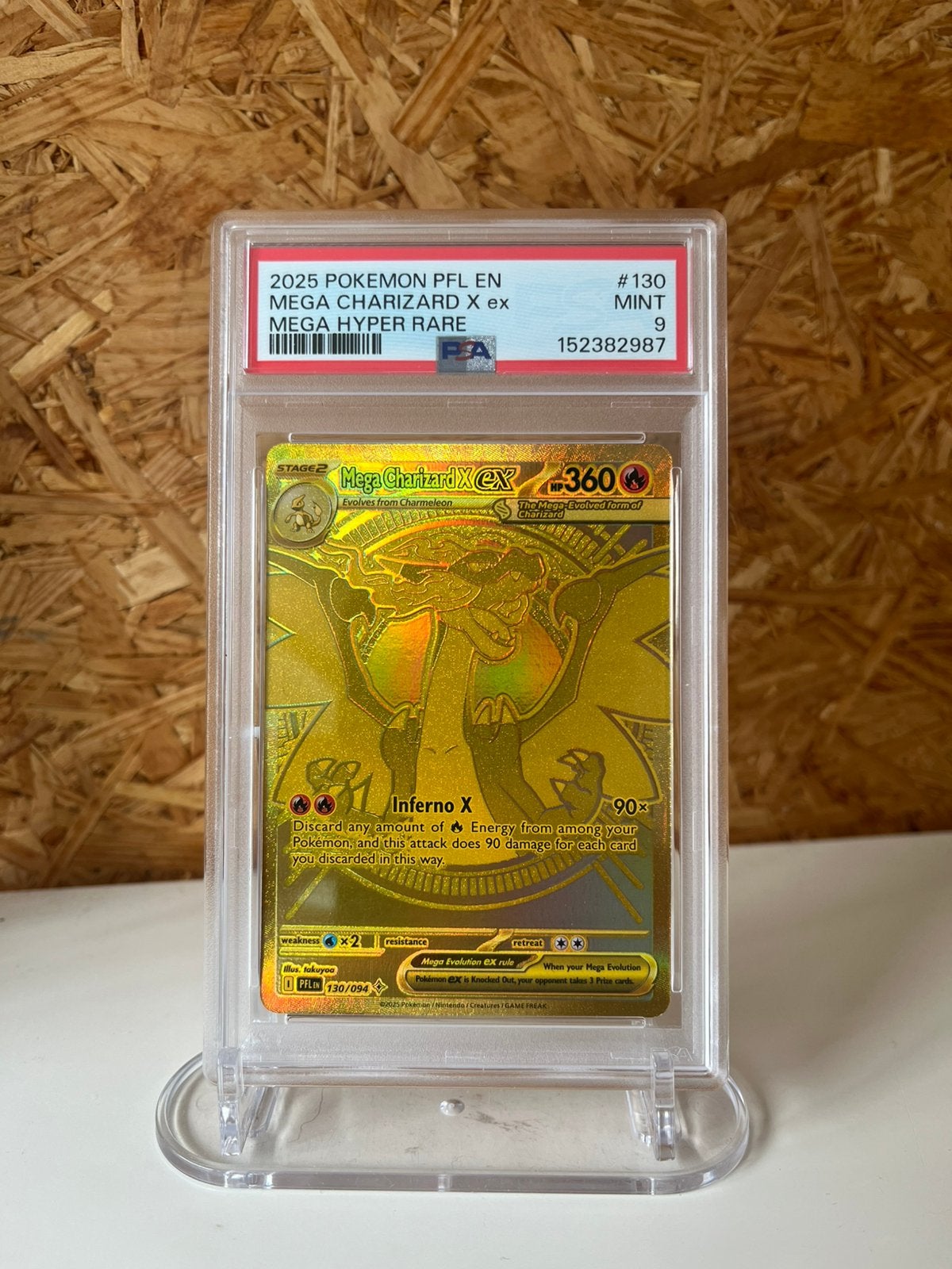 PSA 9 Mega Charizard X ex #130, Ophalen of Verzenden, Zo goed als nieuw