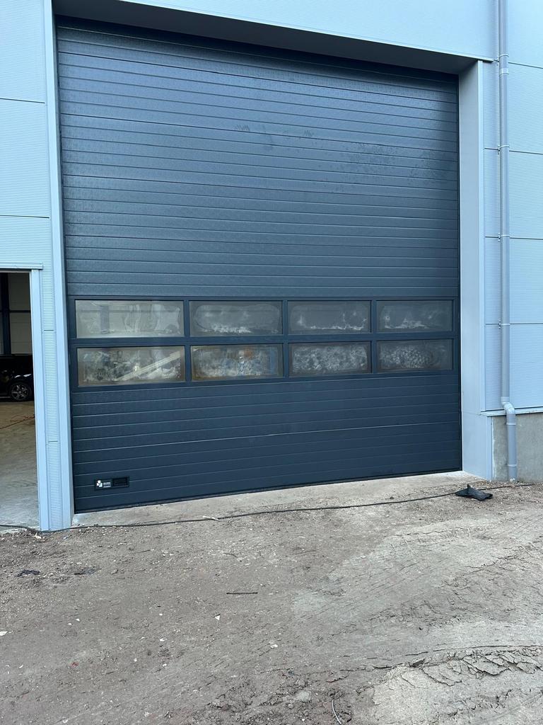 Garagedeur, roldeur, industriedeur, overheaddeur vervangen?, Gebruikt, Garagedeur, Ophalen of Verzenden, 120 cm of meer