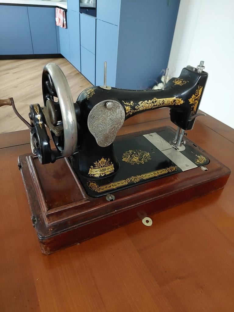 Oude  singer naaimachine, Ophalen