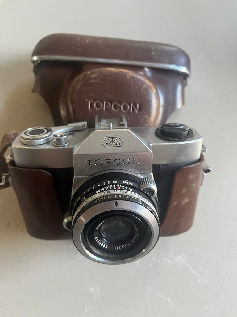 Topcon Spiegelreflexcamera met lederen tas, Ophalen of Verzenden, Gebruikt, Spiegelreflex, Overige Merken