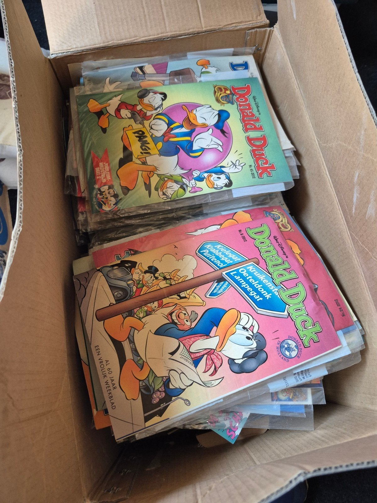 Doos vol oude Donald Ducks - Diverse jaargangen, Boeken, Meerdere stripboeken, Ophalen, Gelezen, Walt Disney