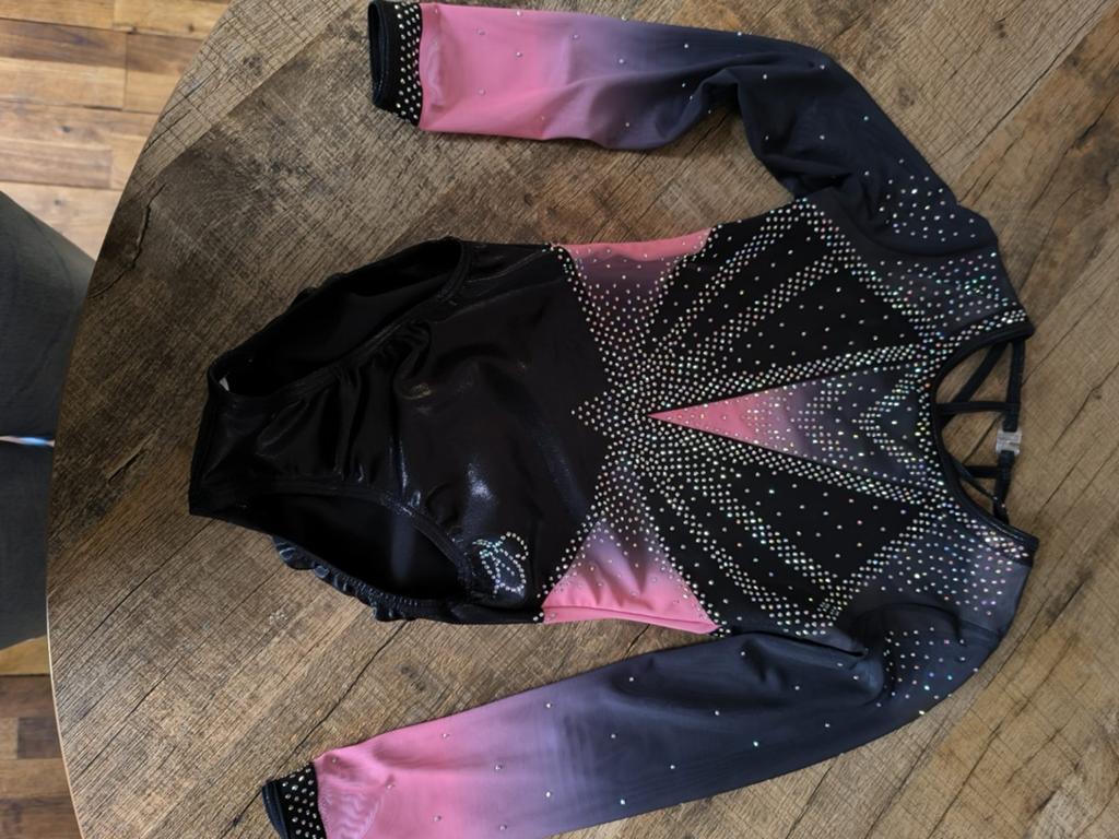 Turnpakje sparkle and dream zwart/roze met steentjes, Sport en Fitness, Turnen, Zwart, Ophalen of Verzenden, Zo goed als nieuw