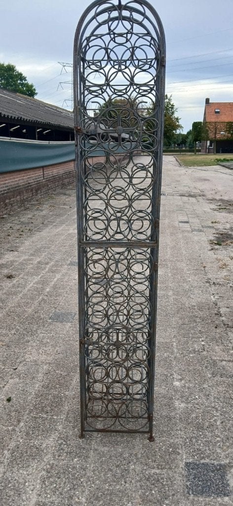 Lange decoratieve smeedijzeren wijnrek, Huis en Inrichting, Ophalen, Gebruikt, 25 flessen of meer, 75 – 100