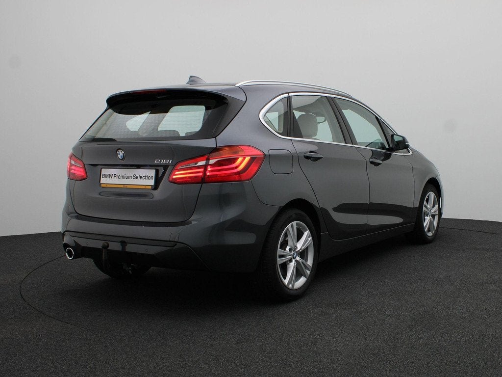 BMW 2 Serie Active Tourer 218i High Executive | Sportline |, Auto's, BMW, Gebruikt, Euro 6, Met garantie (alle), Grijs