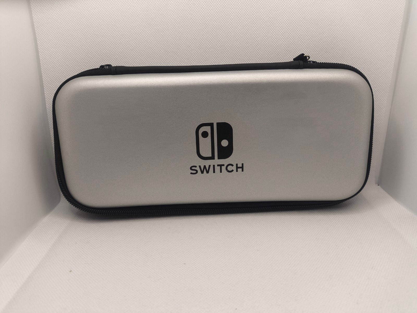 Zilveren Nintendo Switch opberghoes - nieuw, Ophalen of Verzenden, Zo goed als nieuw