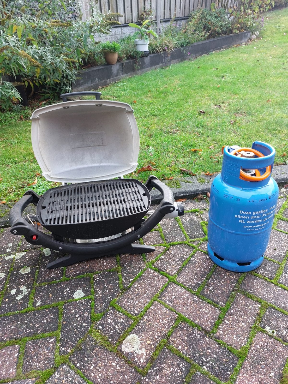 Weber Q1000 gasbarbecue met gasfles, Ophalen, Gebruikt