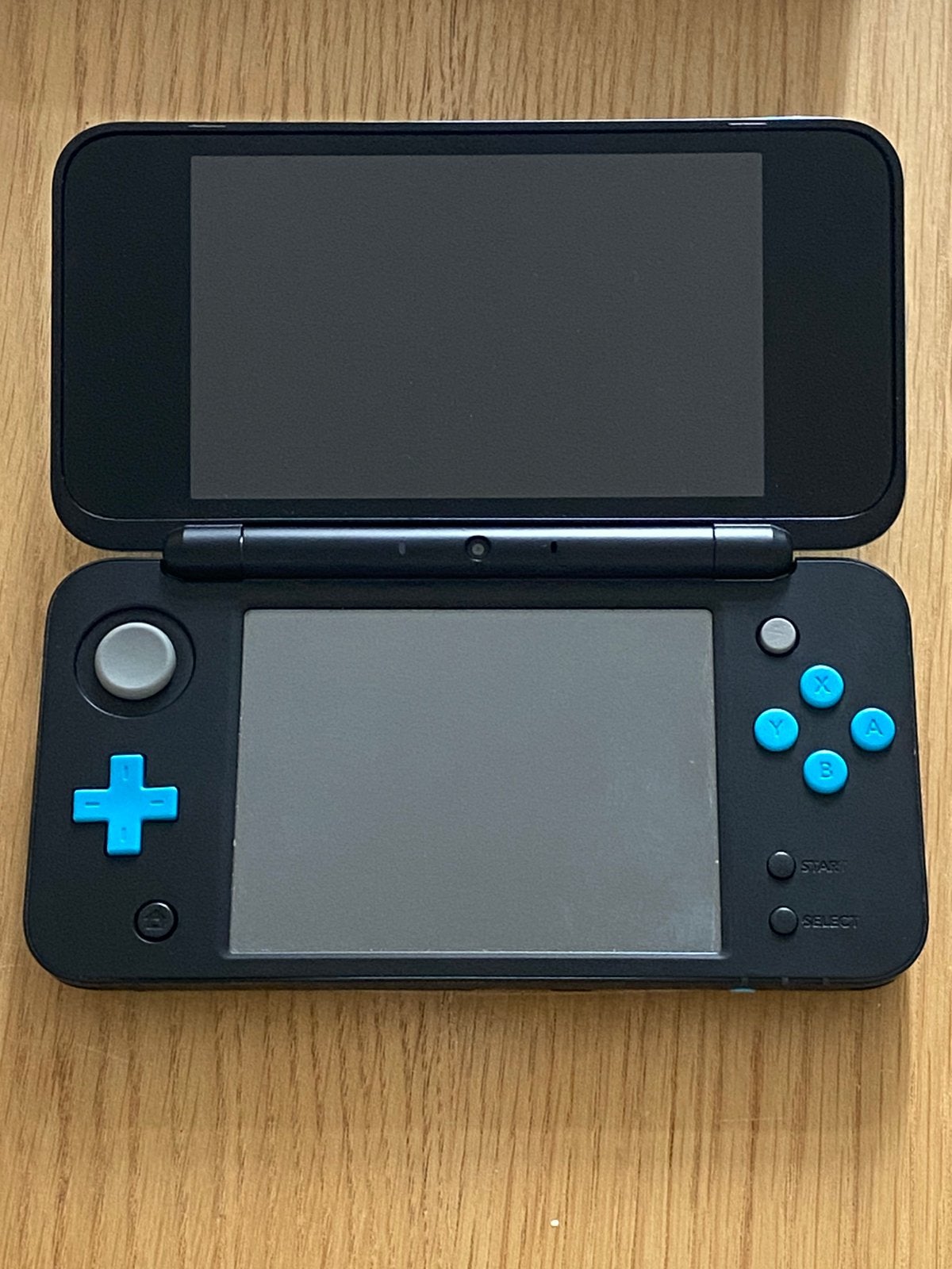 2ds XL + oplader en leren tas, Spelcomputers en Games, Ophalen of Verzenden, Zo goed als nieuw, 2DS