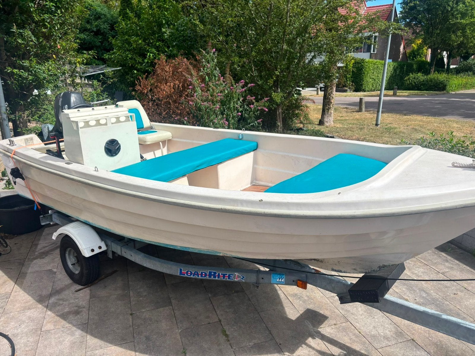Console boot met Suzuki 15 pk motor en trailer, Ophalen