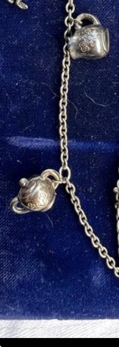 2 zilveren bedels suikerpotje melkkannetje met edelweiss, Ophalen of Verzenden, Zilver