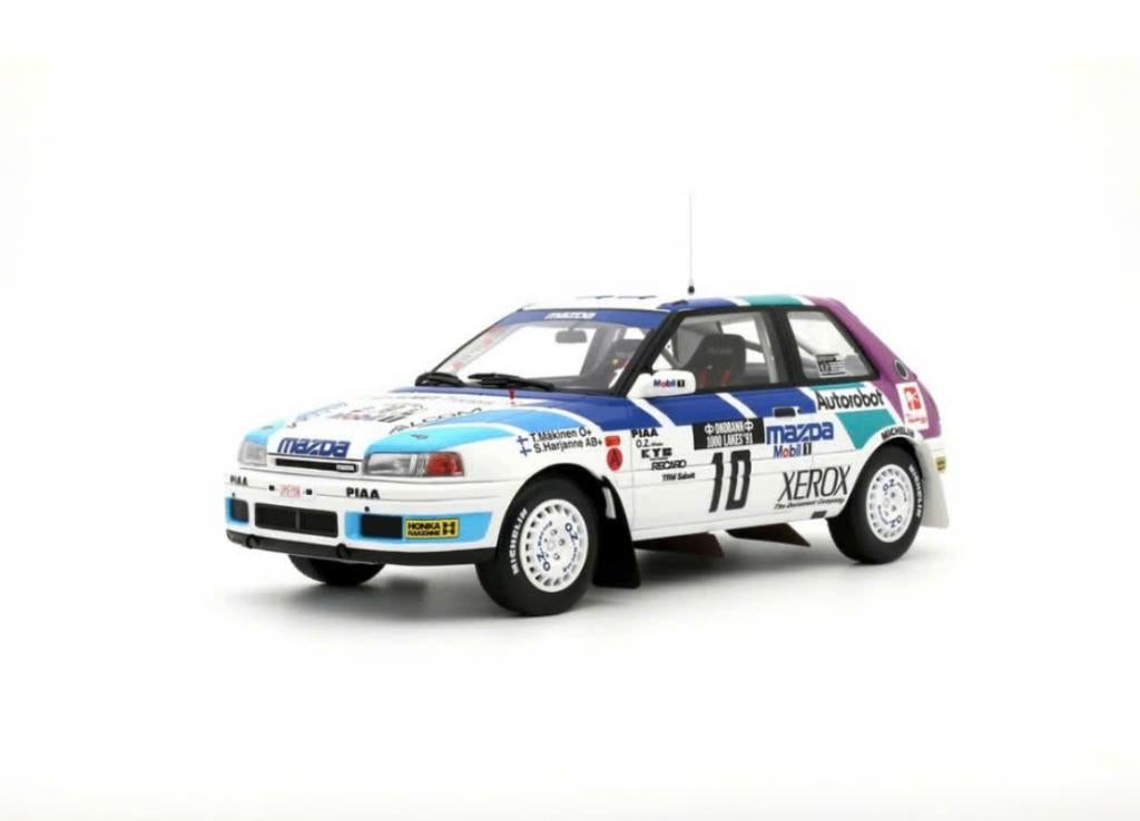 MAZDA 323 GTX GR.A 1000 LAKES 1991 OTTO MOBILE 1/18 OT1099, Hobby en Vrije tijd, Modelauto's | 1:18, Verzenden, Nieuw, Auto, OttOMobile