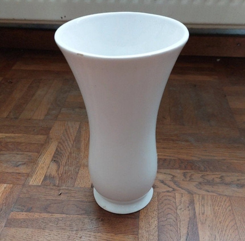 witte vaas, Ophalen