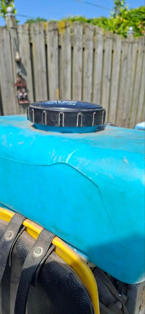 Domina Motor rugspuit ., Ophalen