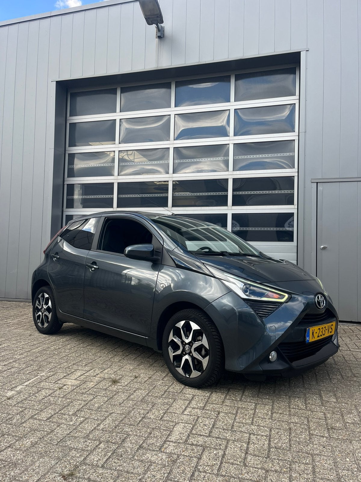 Toyota Aygo 1.0 Vvt-i 72pk 5D 2018 x-clusiv, Auto's, Voorwielaandrijving, 4 stoelen, Zwart, Handgeschakeld