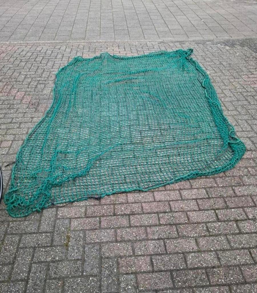 Aanhangwagen net - Afdeknet om verlies van lading te voorkom, Ophalen