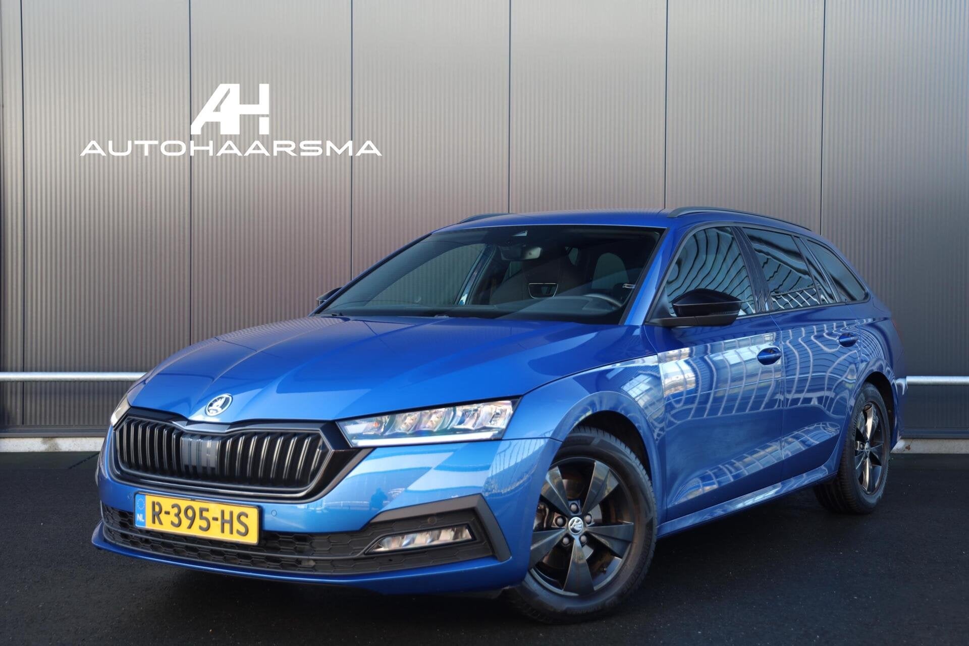 Skoda Octavia Combi 1.0 TSI 110pk Sport Business Stoelverwar, Auto's, Stof, Gebruikt, Blauw, Origineel Nederlands