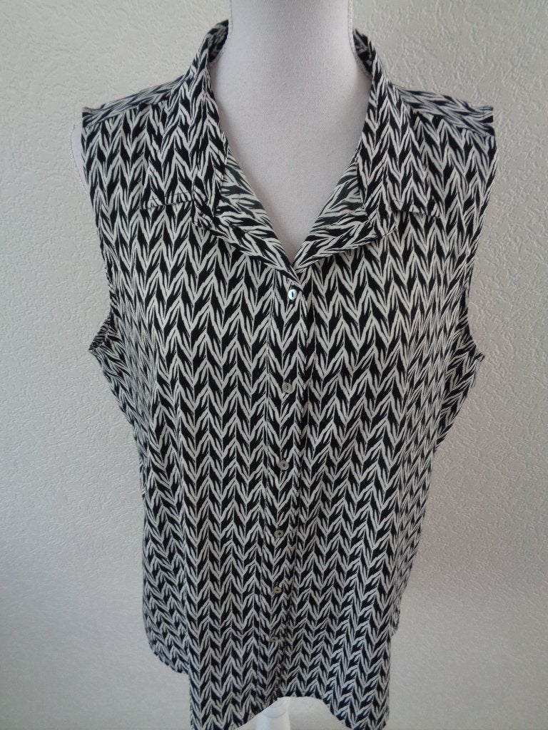 maat 48 oksel tot oksel 60 cm