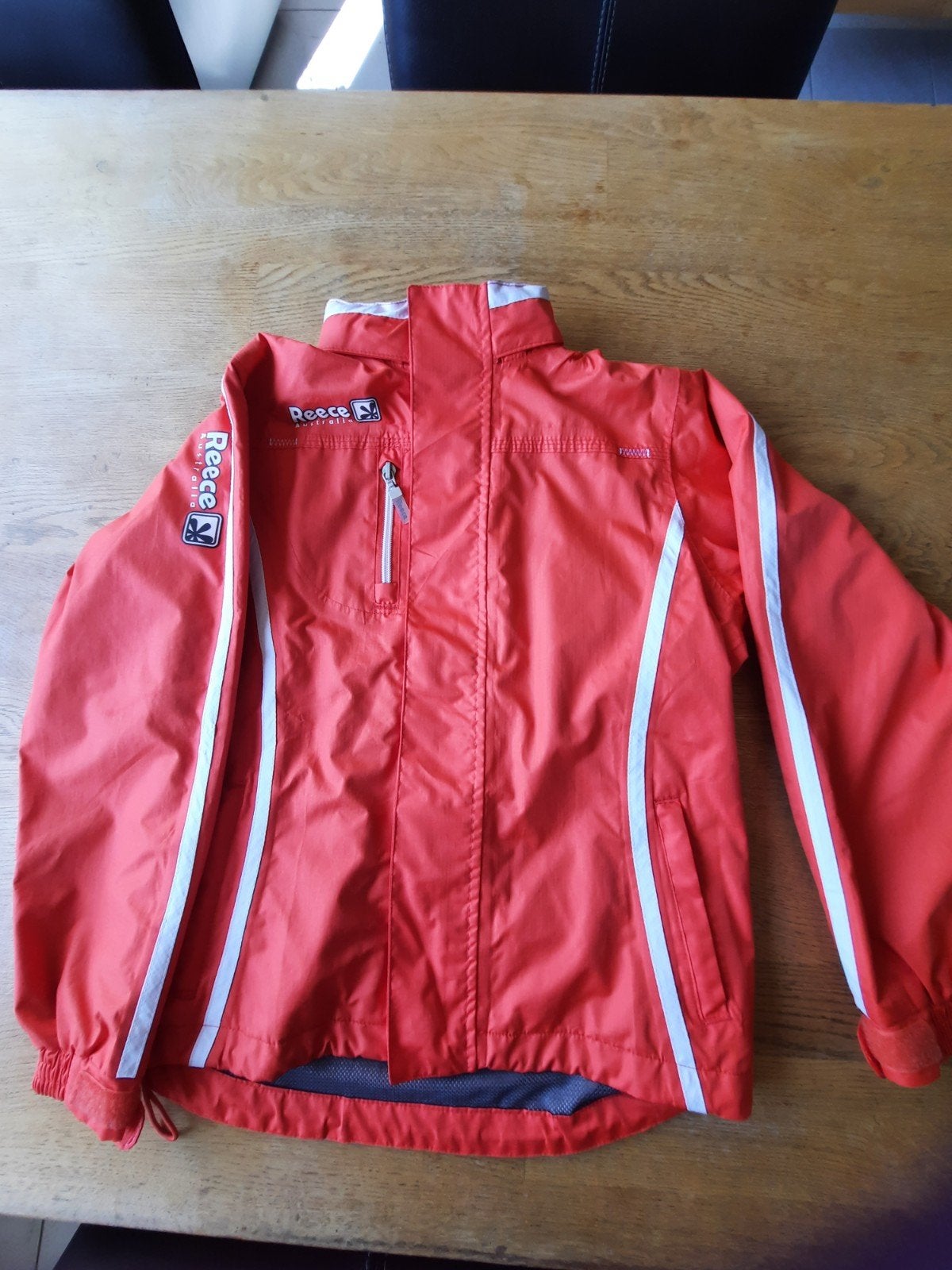 Reece, hockey trainings, sport, regen jack, maat 140, oranje, Ophalen of Verzenden, Zo goed als nieuw, Kleding