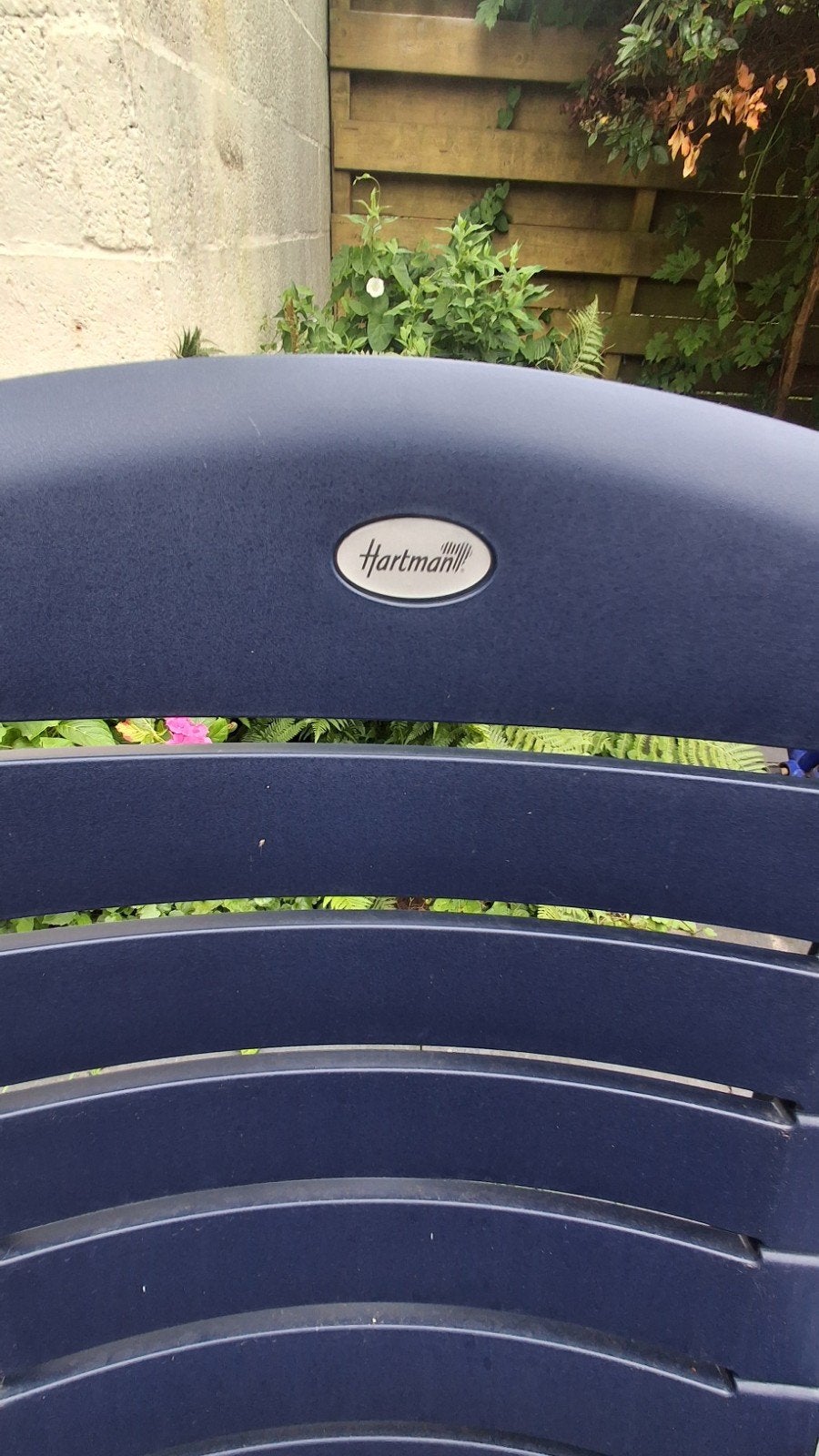 Hartman Kunststof tuinstoel donkerblauw, Tuin en Terras, Tuinstoelen, Ophalen, Gebruikt