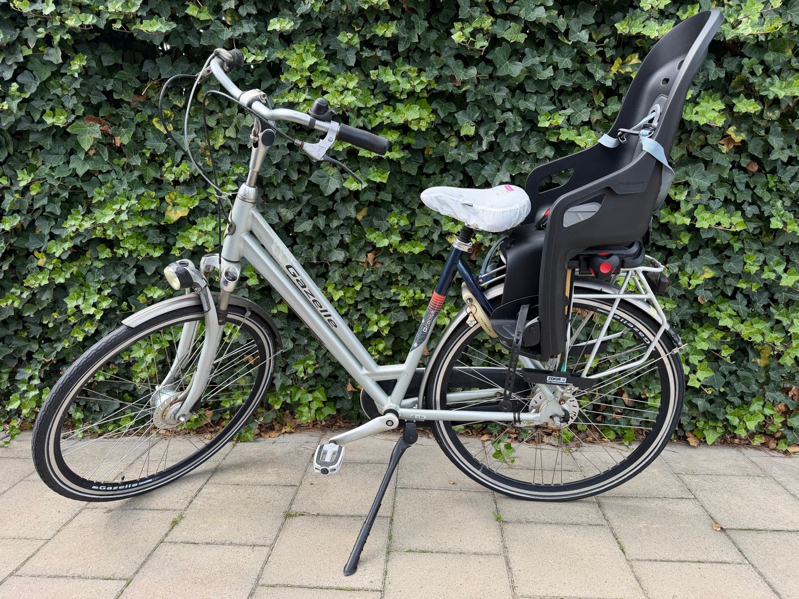 Gazelle damesfiets met kinderzitje - Gebruikt, Terugtraprem, Versnellingen, Ophalen of Verzenden, Gazelle