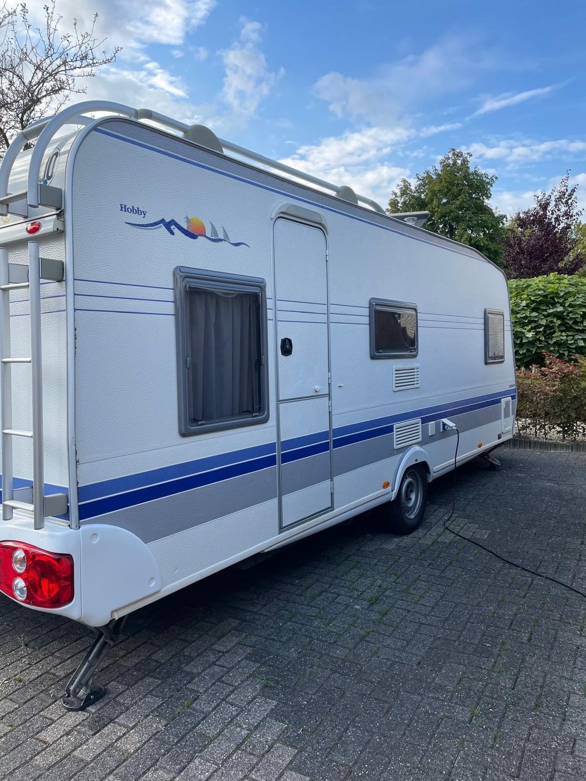 Mooie hobby 560 kmfe, Caravans en Kamperen, Rondzit, Hobby, Frans bed, 7 tot 8 meter