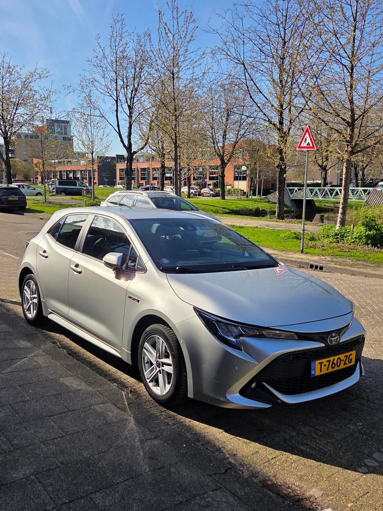 Toyota Corolla 1.8 Hybrid 122pk CVT 2021 Grijs, Auto's, 450 kg, 750 kg, Corolla, 26 km/l