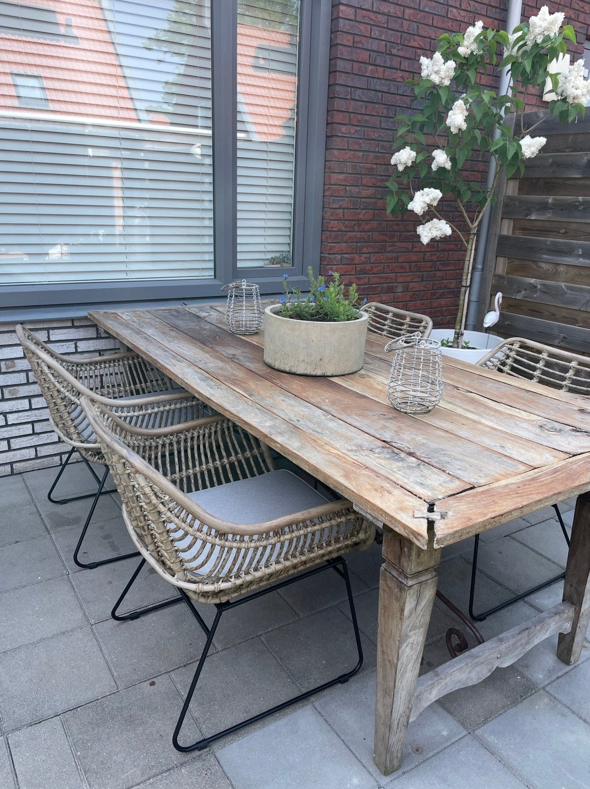 Set van 4 rotan tuinstoelen met zwart metalen onderstel, Ophalen, Gebruikt, Rotan