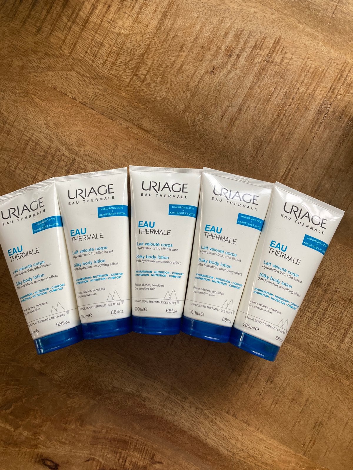 Uriage bodylotion 5 tubes van 200 ml, Ophalen of Verzenden, Nieuw, Bodylotion, Crème of Olie