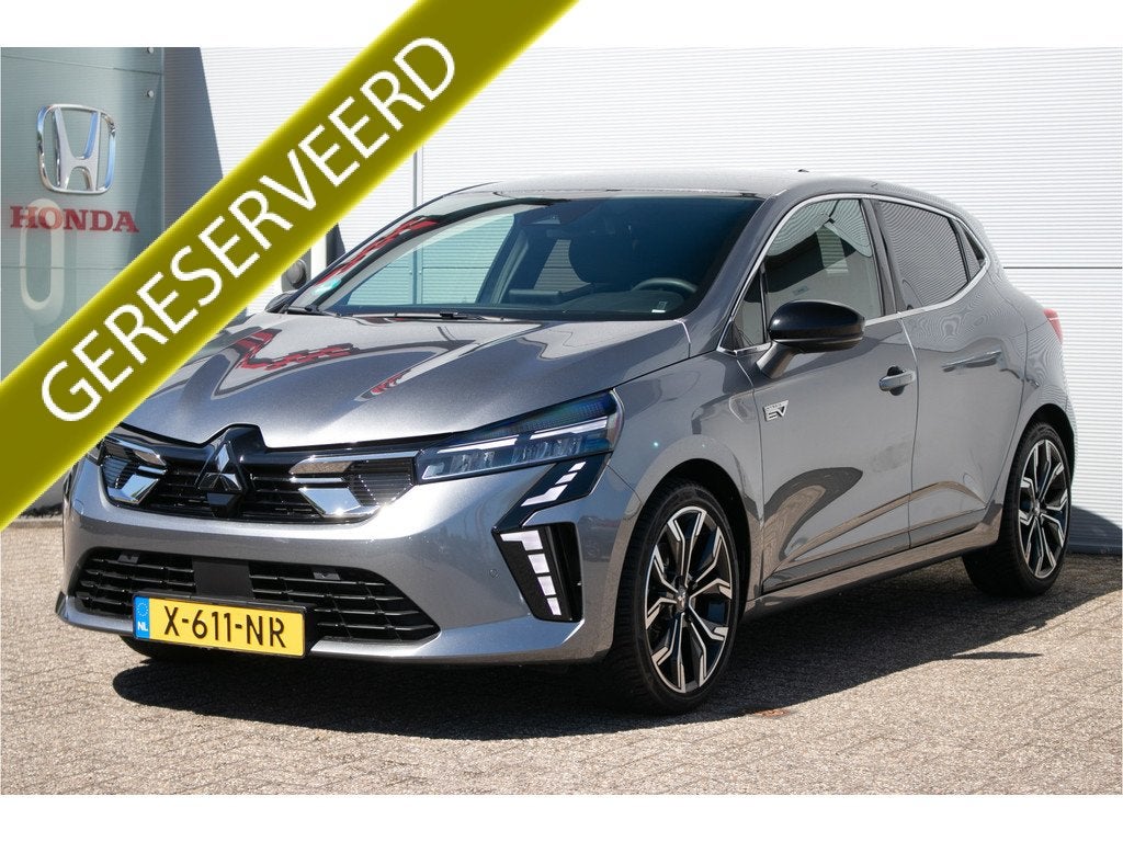 Mitsubishi Colt 1.6 HEV First Edition - 1e eig. | Dealer ond, Auto's, Mitsubishi, 12 maanden, Stof, Gebruikt, Origineel Nederlands