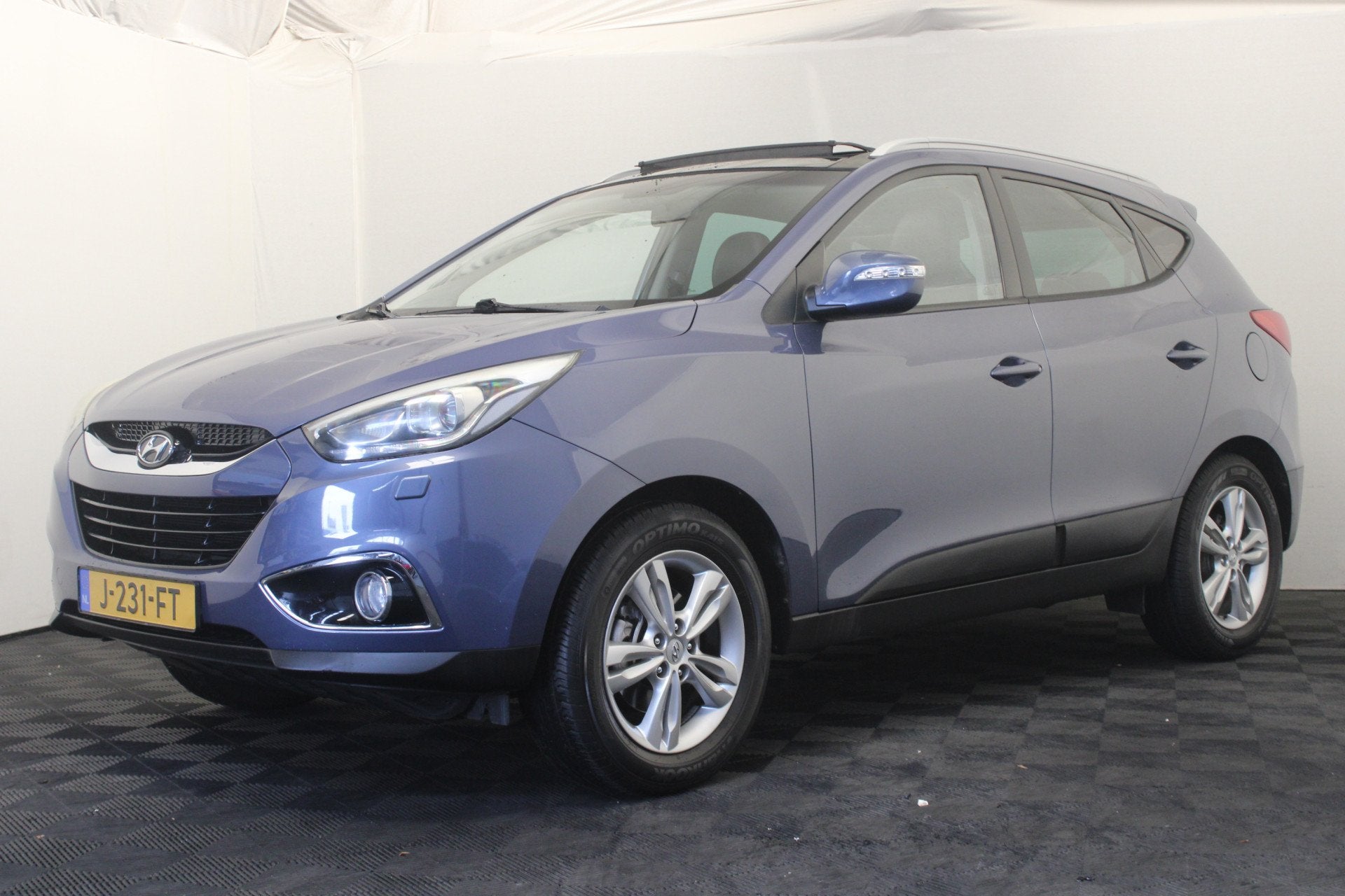 Hyundai ix35 1.6i GDI Business Edition |Pano|Navi|, Auto's, Voorwielaandrijving, Euro 5, 4 cilinders, Blauw