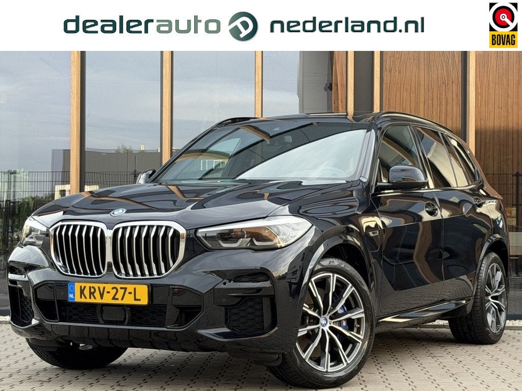 BMW X5 xDrive45e High Executive M Sport | ACC | Luchtvering, Auto's, Dealer onderhouden, Gebruikt, Zwart, Verwarmde buitenspiegels