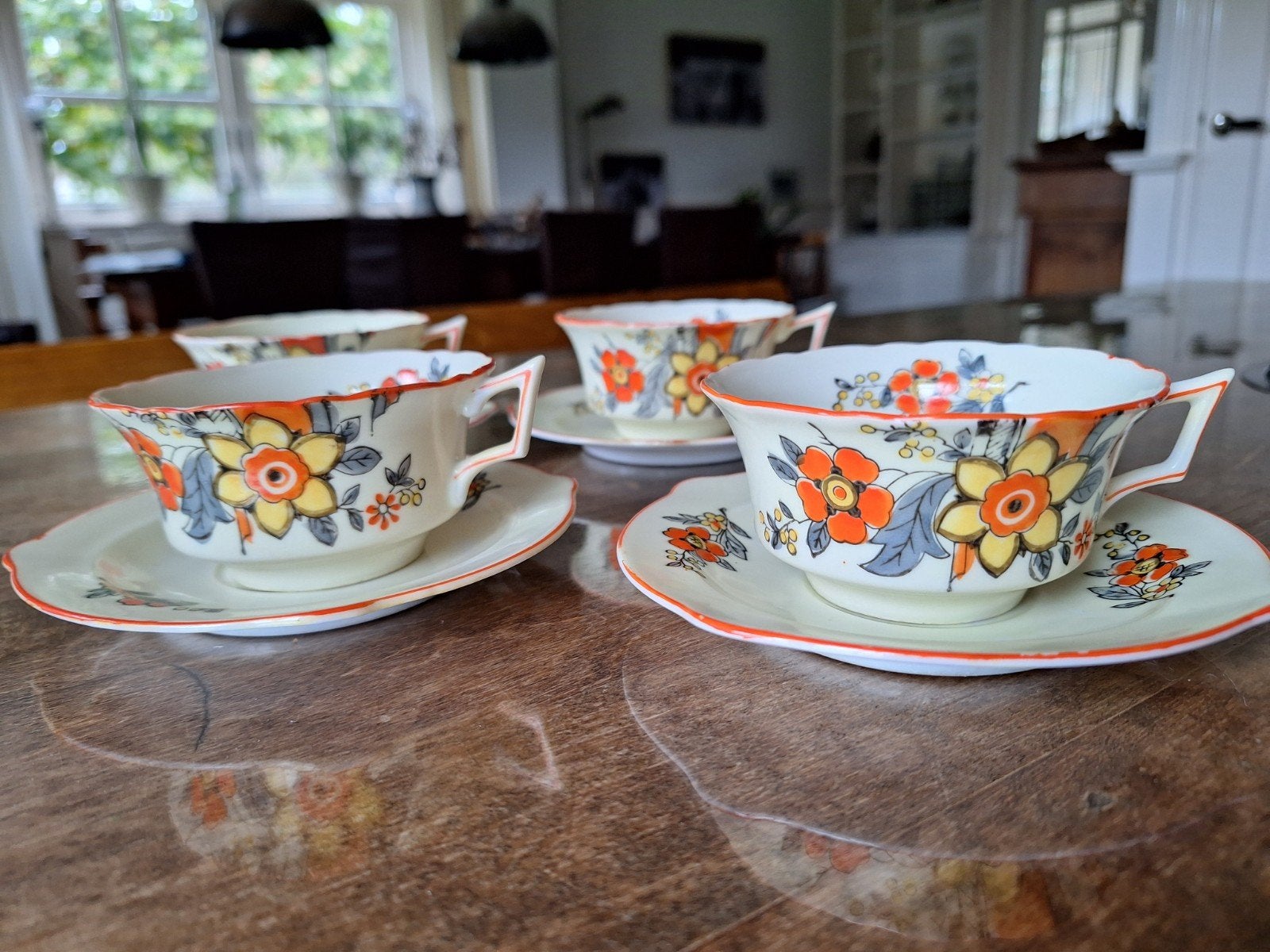 4 porseleinen kop en schotels Art Deco, Ophalen of Verzenden