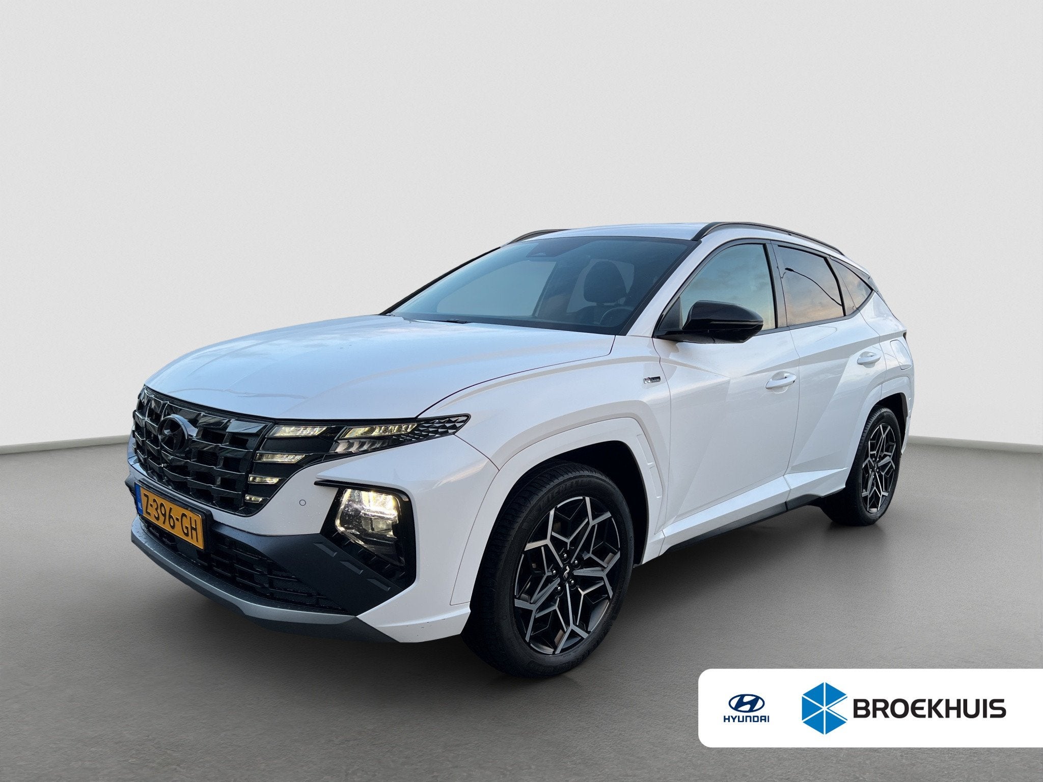 Hyundai Tucson 1.6 T-GDI 265pk PHEV N-Line 4WD, Auto's, Gebruikt, 4 cilinders, Wit, Vierwielaandrijving