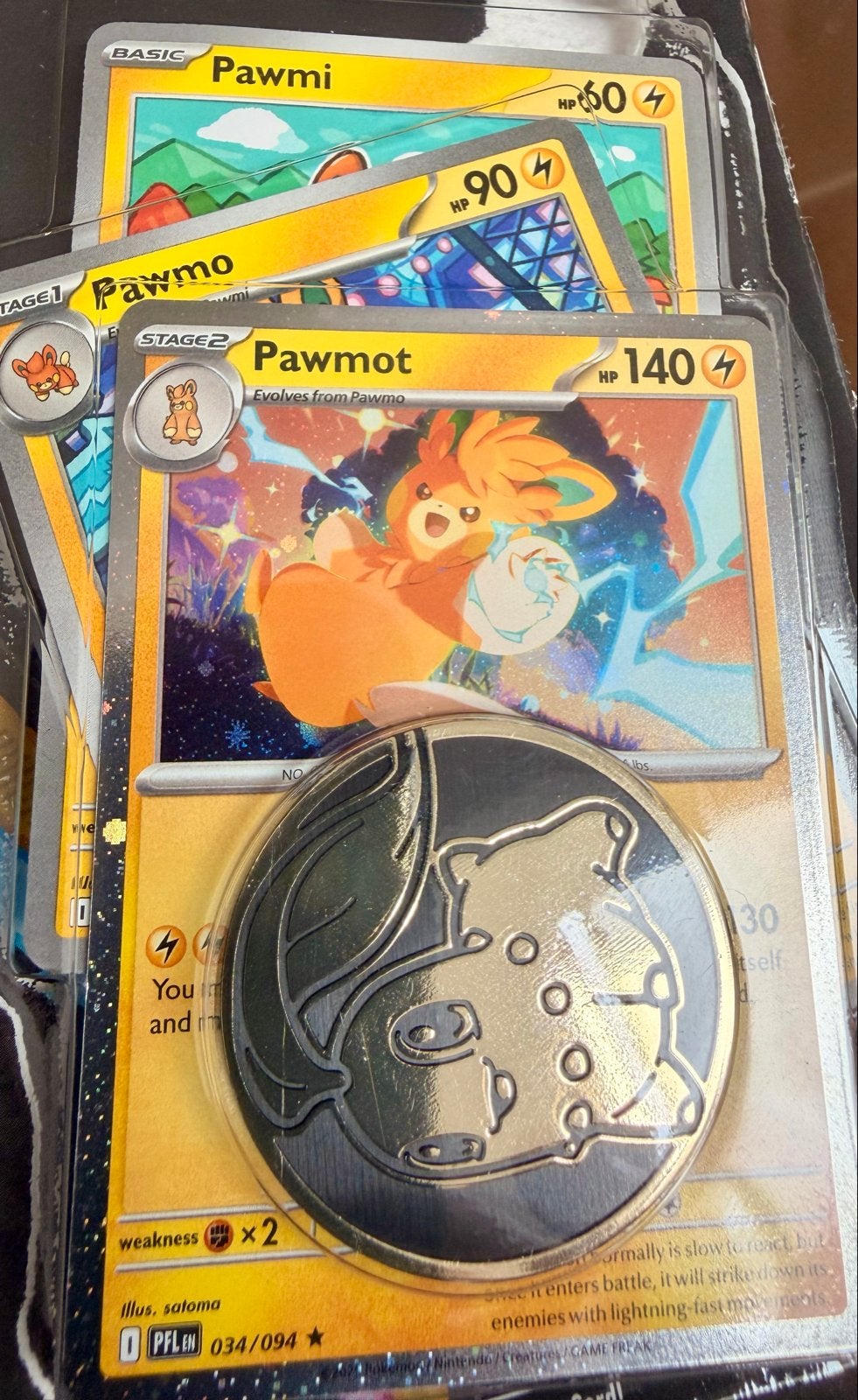 Pawmi, Pawmo, Pawmot Evolution Blister met Pachirisu munt, Ophalen of Verzenden, Zo goed als nieuw, Meerdere kaarten, Foil
