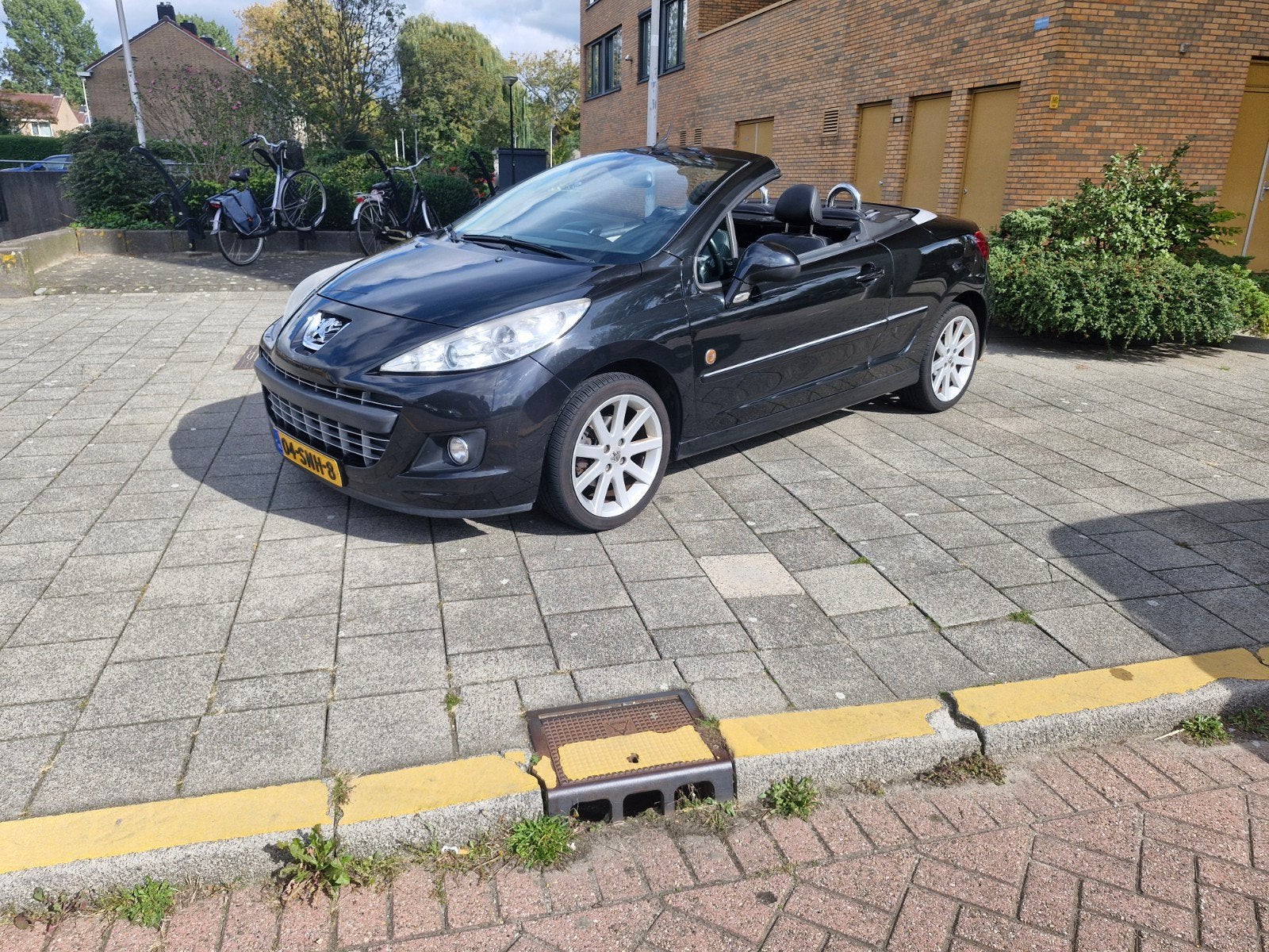 Peugeot 207 1.6 16V CC 88KW 2011 Zwart, Auto's, Voorwielaandrijving, 15 km/l, 4 cilinders, Cabriolet