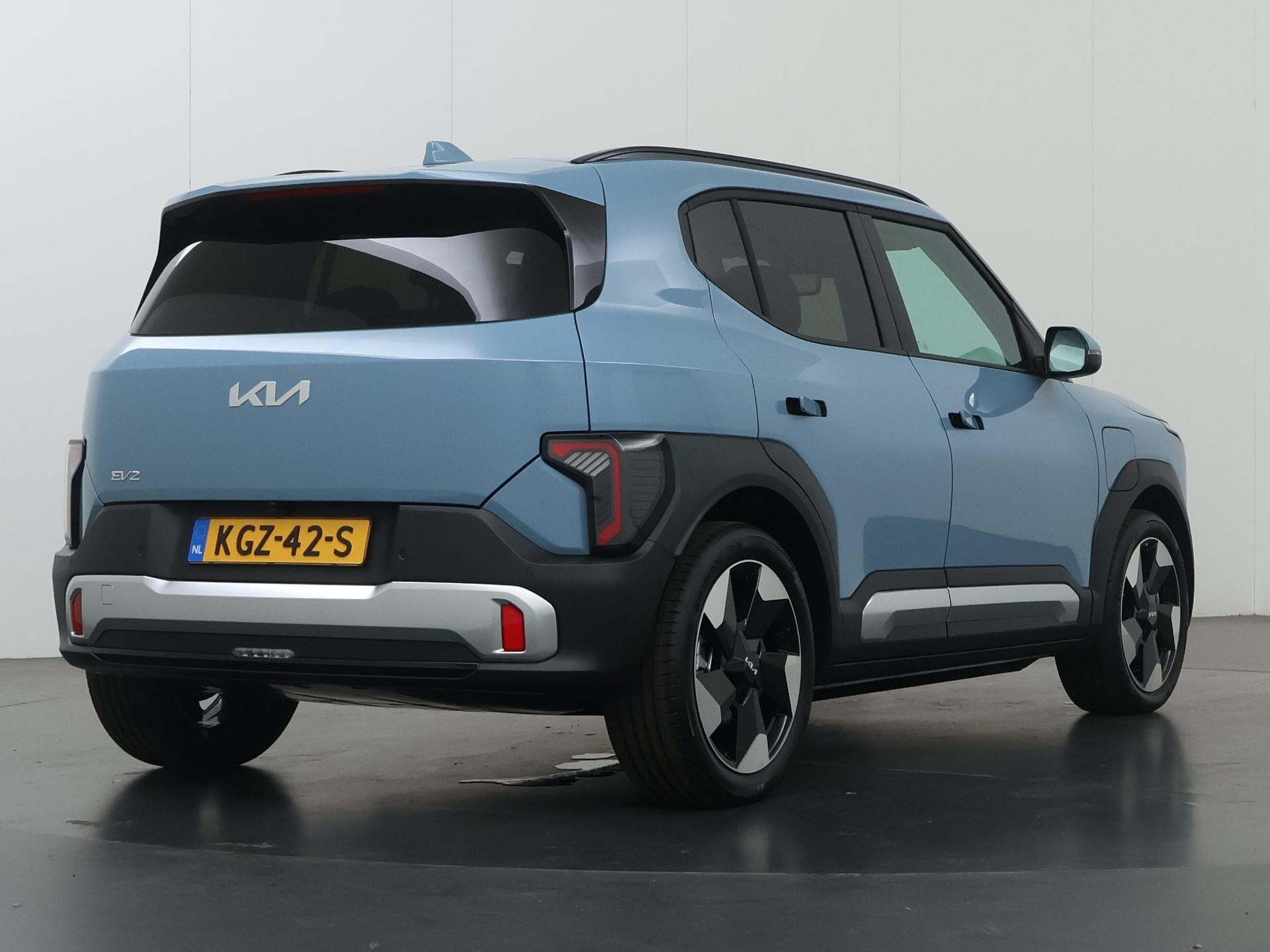 Kia EV2 Plus Advanced 42.2 kWh | Glazen schuif-/kanteldak |, Stof, Blauw, 750 kg, Automatische klimaatregeling