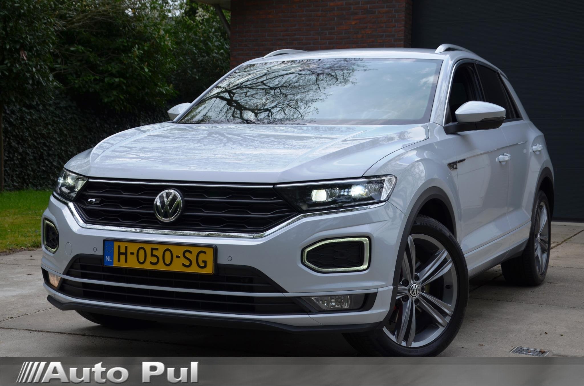 Volkswagen T-Roc 1.5 TSI Sport Business R Line Automaat/Navi, Auto's, Volkswagen, Stof, 4 cilinders, 150 pk, Automatische klimaatregeling