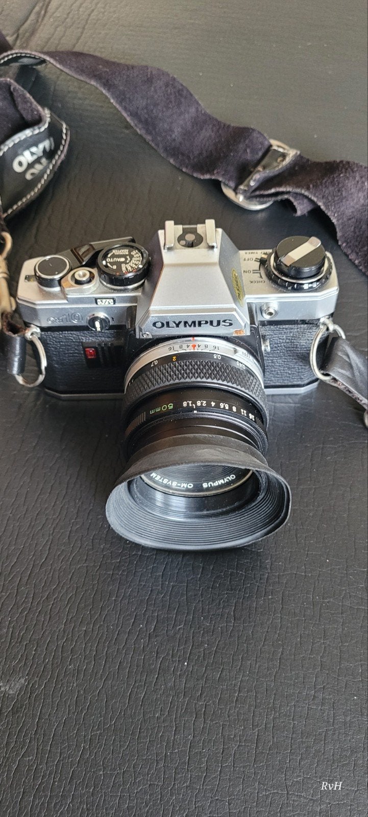 Olympus OM10 Spiegelreflexcamera met 3 lenzen en flitser, Audio, Tv en Foto, Fotocamera's Analoog, Ophalen of Verzenden, Gebruikt