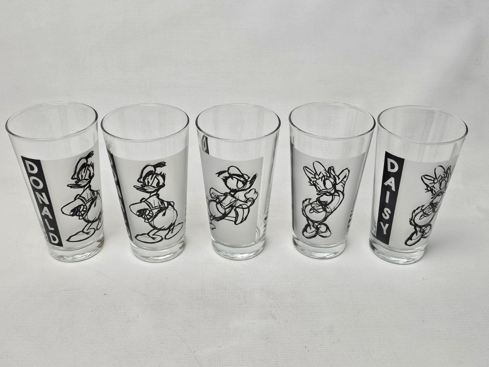 # 5 Disney glazen: 3x Donald Duck, 2x Katrien Duck, Verzamelen, Ophalen of Verzenden, Donald Duck, Gebruikt, Servies