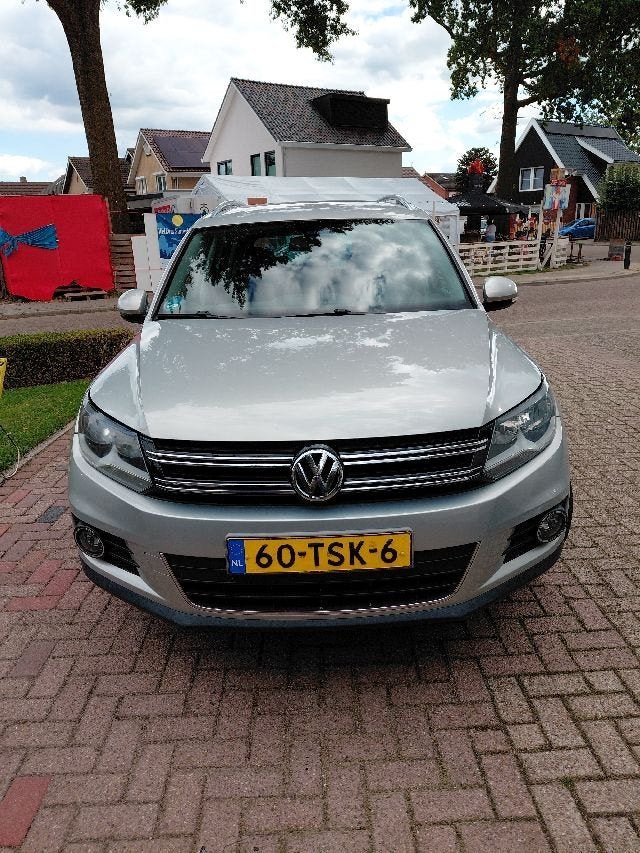Volkswagen Tiguan 1.4 TSI 118KW BMT 2012 Grijs, Auto's, Voorwielaandrijving, 15 km/l, 1800 kg, 4 cilinders