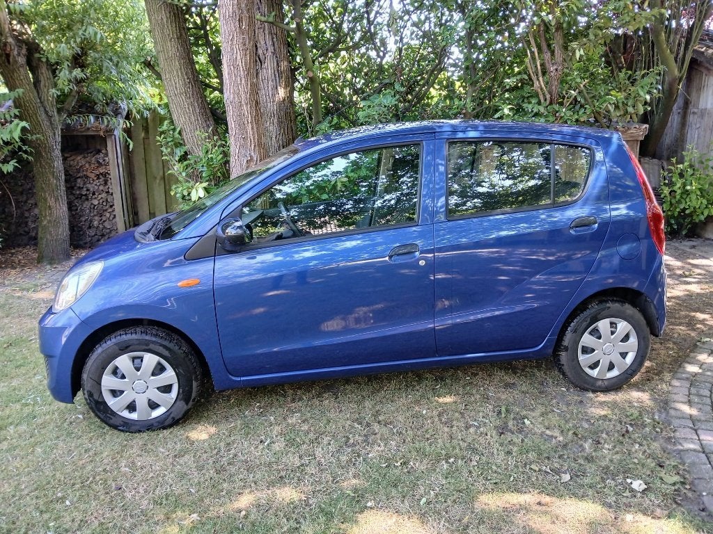 Daihatsu Cuore 1.0 5D 2009 Blauw, Auto's, Daihatsu, Voorwielaandrijving, Stof, 600 kg, 840 kg