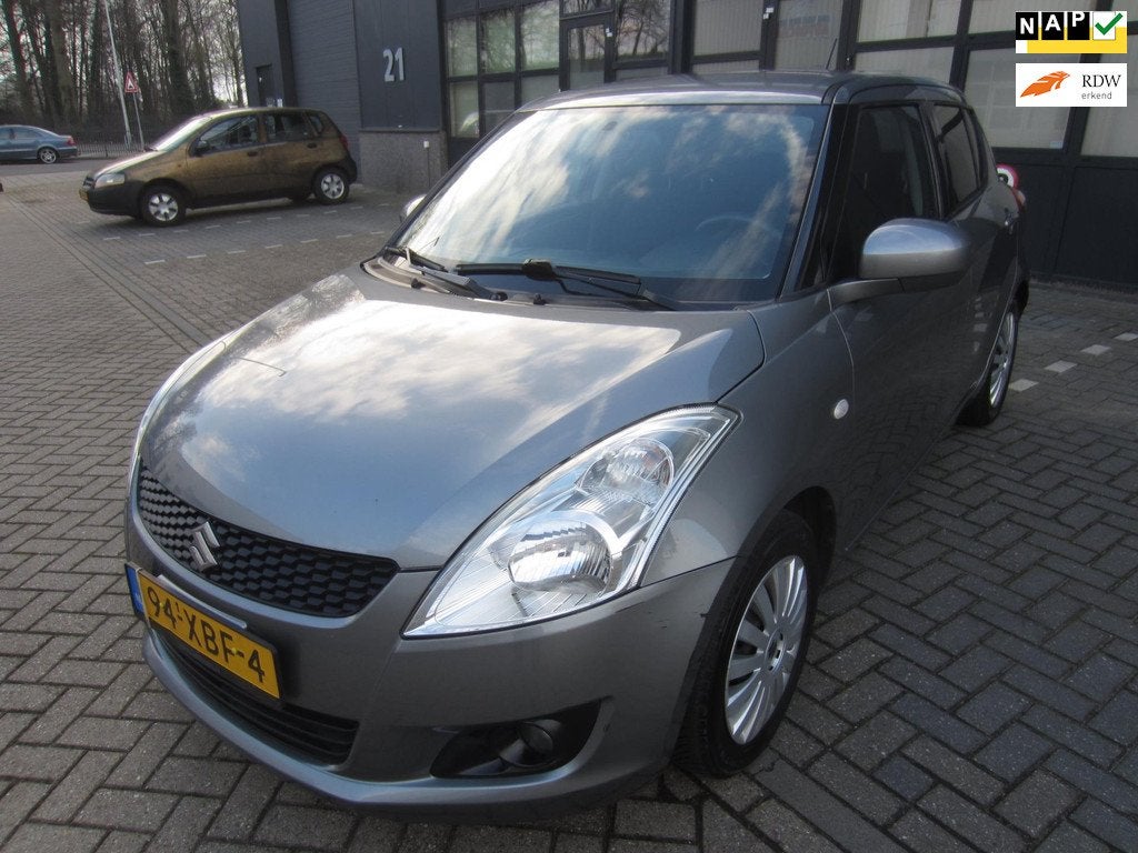 Suzuki Swift 1.2 Exclusive EASSS 2012 Airco Cruise 5-Deurs N, Voorwielaandrijving, Gebruikt, 4 cilinders, 400 kg