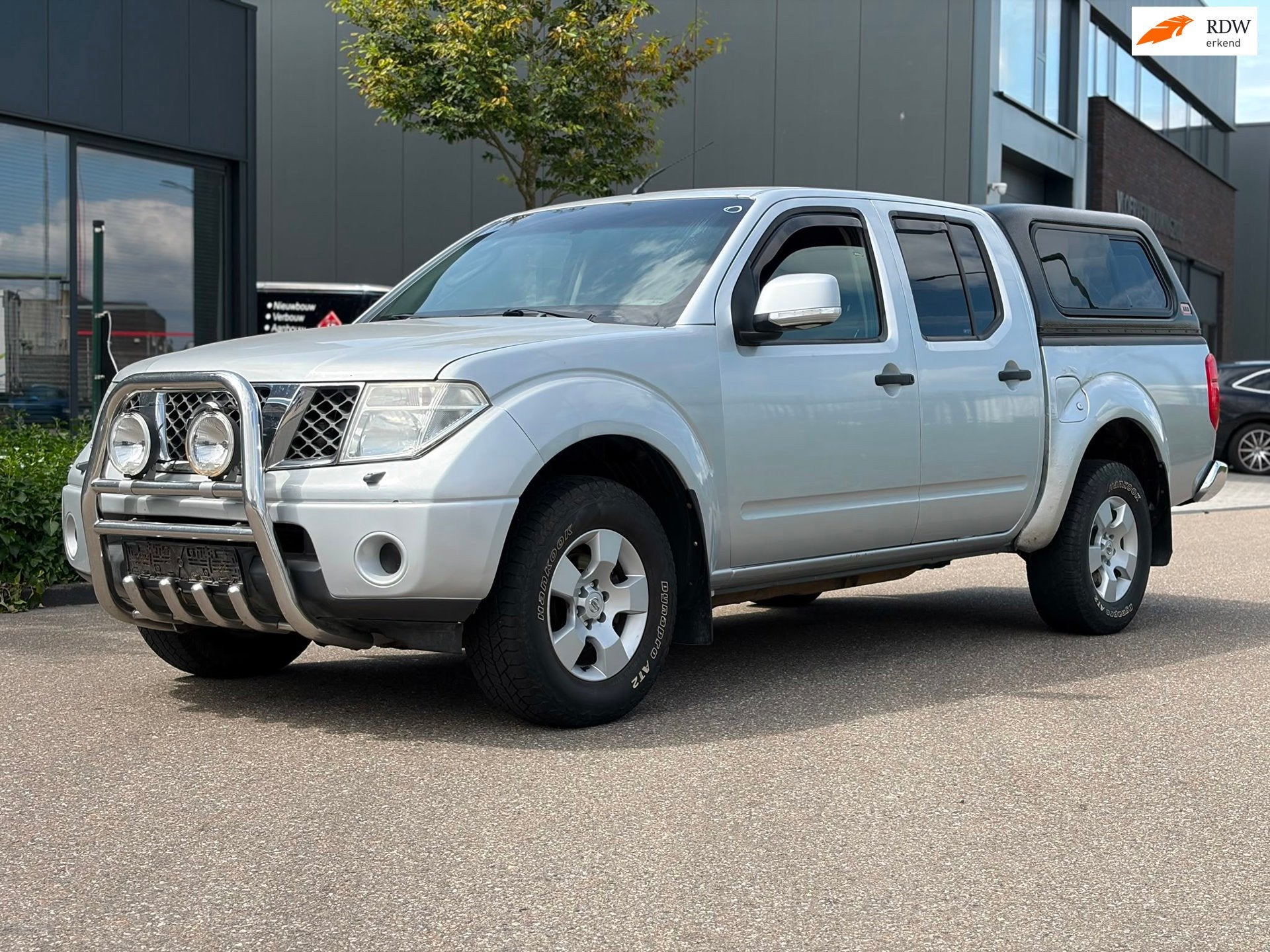 Nissan Navara 2.5 dCi SE Double Cab Export, Stof, Gebruikt, Origineel Nederlands, Bedrijf