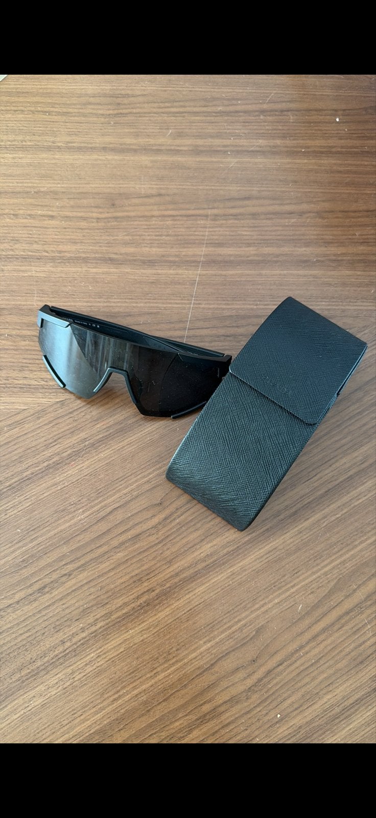 Prada Zonnebril SPS04W - Zo goed als nieuw, Sieraden, Tassen en Uiterlijk, Overige merken, Zonnebril, Zwart, Ophalen of Verzenden