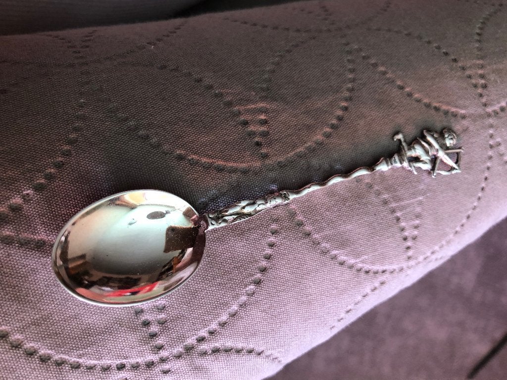 Zilver lepeltje met boogschutter, Verzamelen, Ophalen of Verzenden, Gebruikt, Overige materialen, Bestek