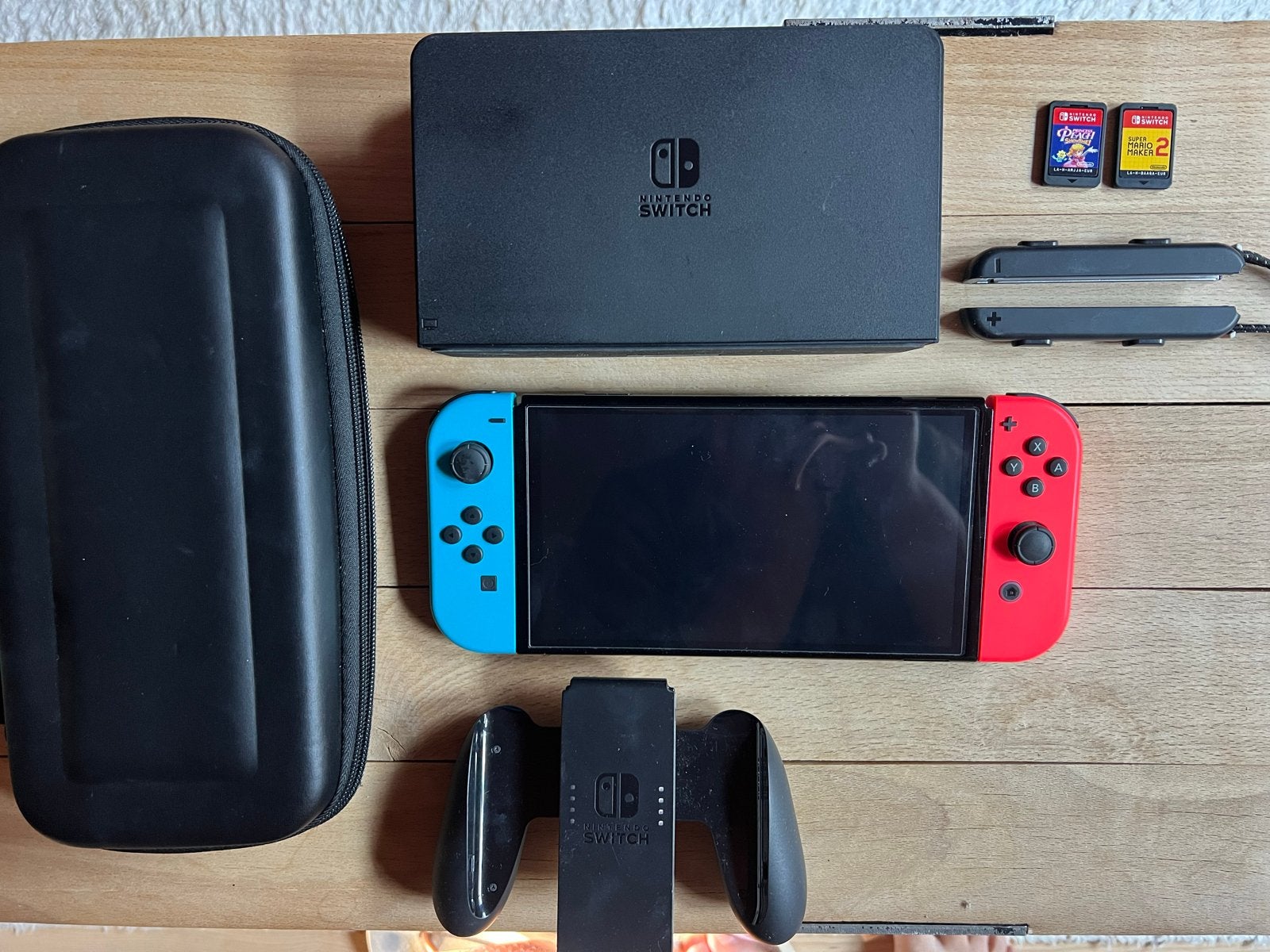 Nintendo Switch Oled met accessoires en games
