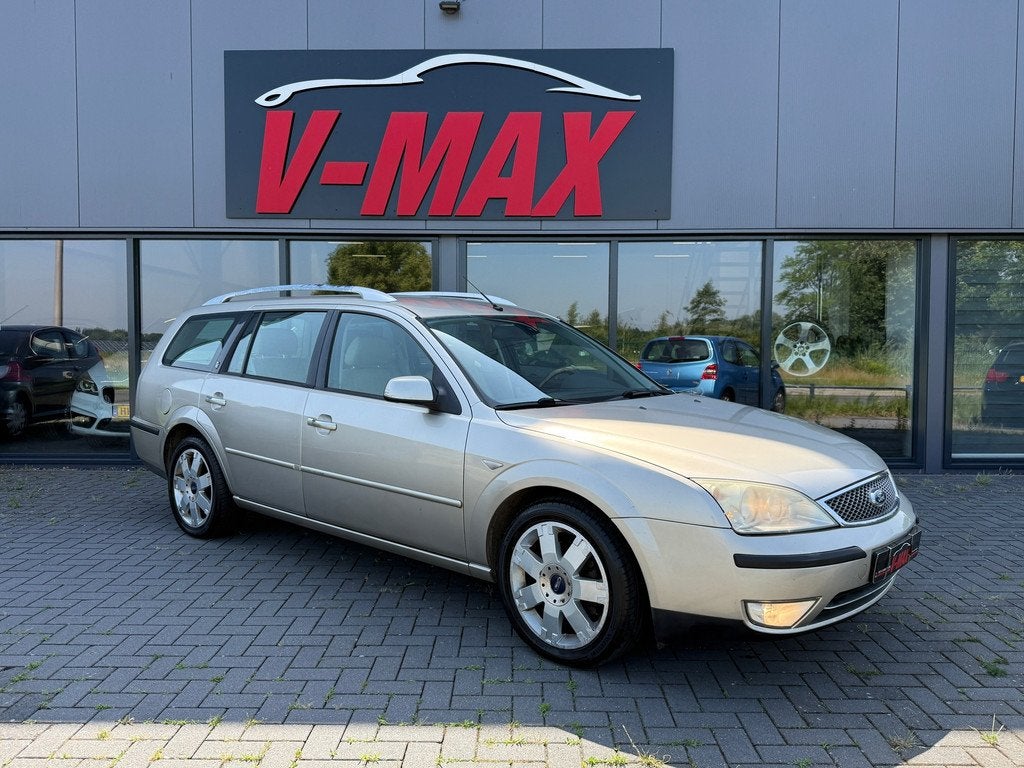 Ford Mondeo Wagon 2.0 16V AUT Ghia Executive Leder Navi Trek, Auto's, Ford, 730 kg, Mondeo, Beige, Onderhoudsboekje