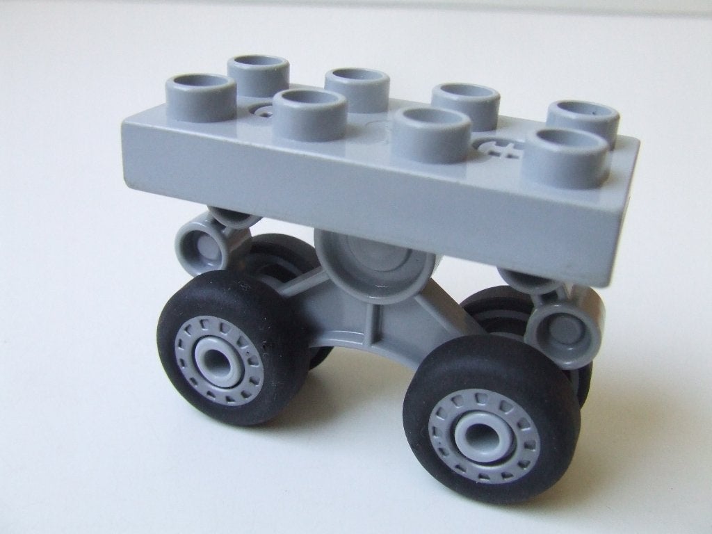 Lichtblauw grijs Duplo vliegtuig landingsgestel met 4 wielen, Ophalen of Verzenden, Zo goed als nieuw, Duplo