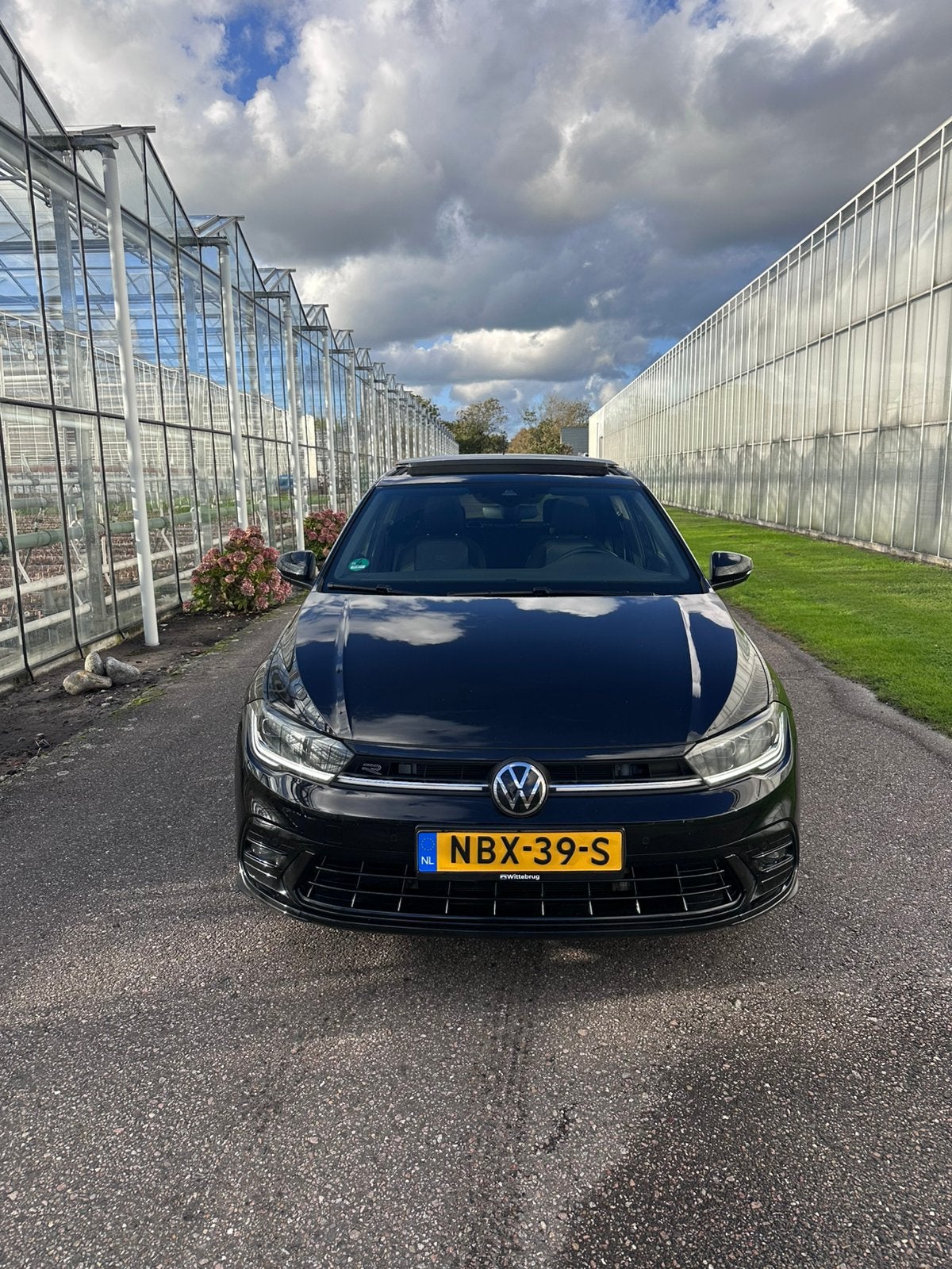 Volkswagen Polo 1.0 TSI 110pk Dsg-7 2023 3x R-LINE, Auto's, Zwart, 3 cilinders, 1100 kg, Geïmporteerd