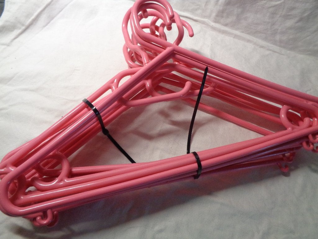 11 roze kunststof kleding hangers, Ophalen of Verzenden, Zo goed als nieuw, Roze, Kunststof